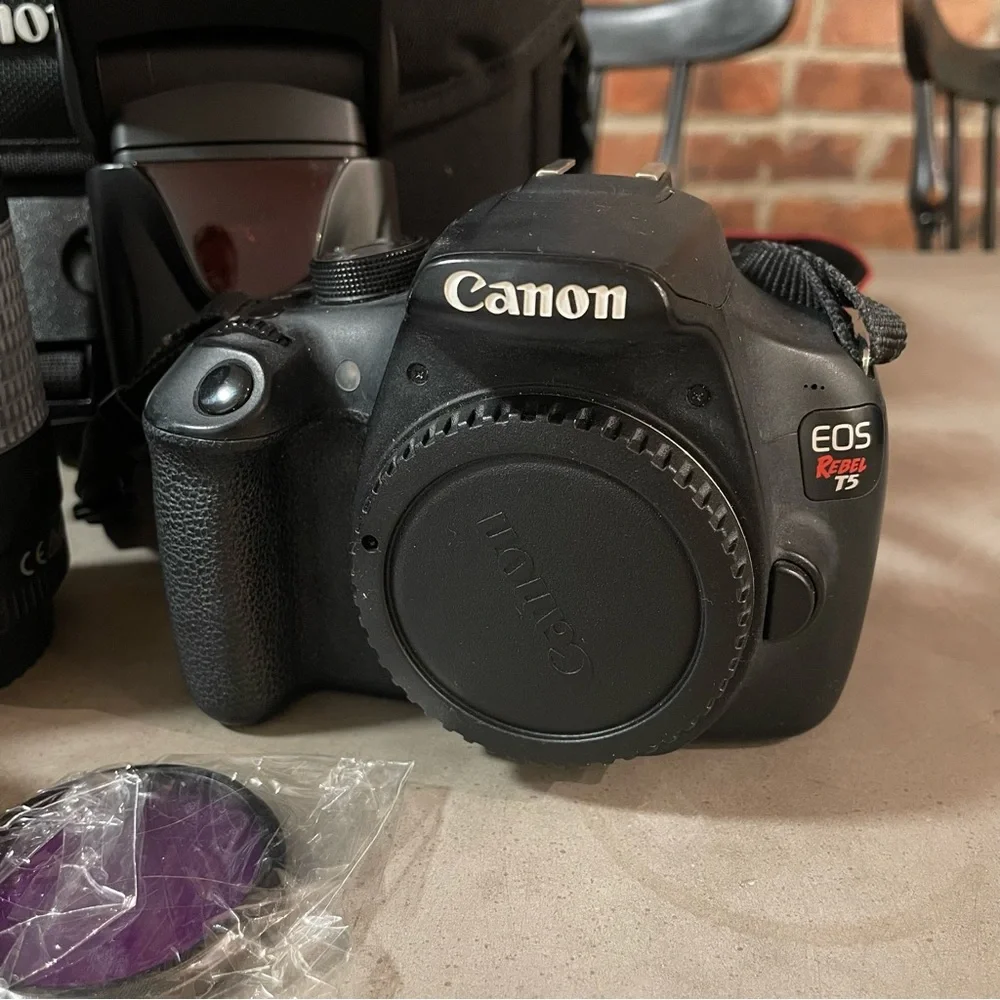 Canon EOS Rebel T5 with 3 lenses, external flash, and more